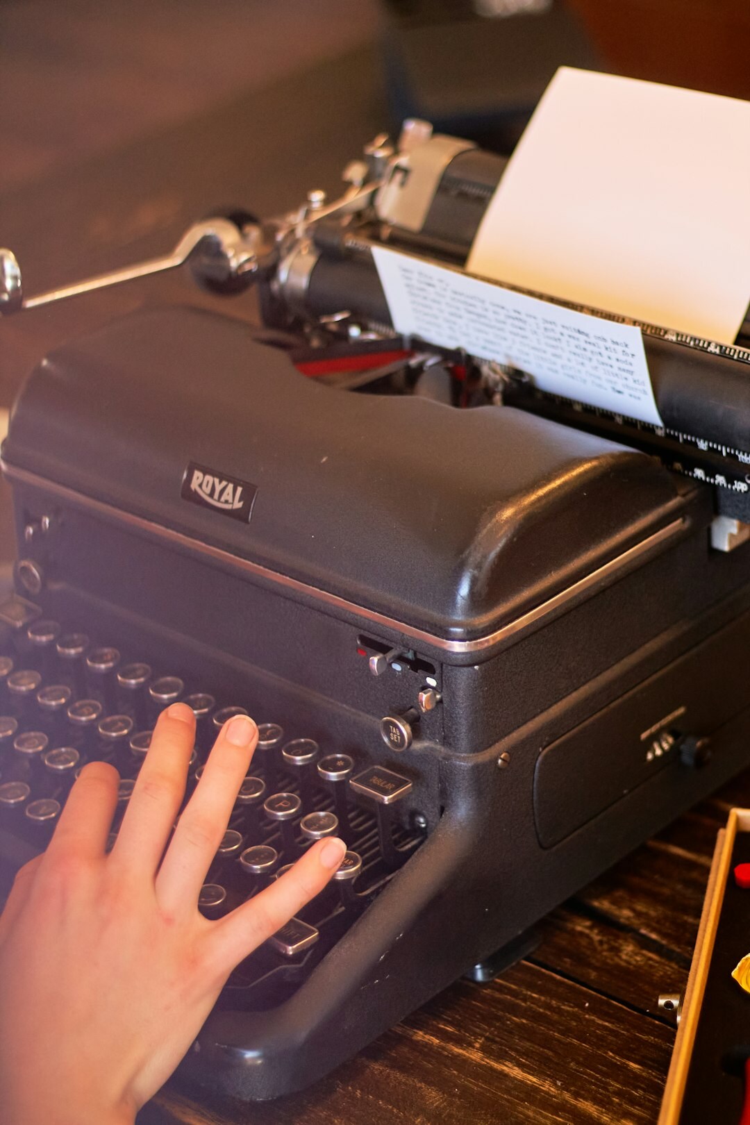 mystery writer at typewriter