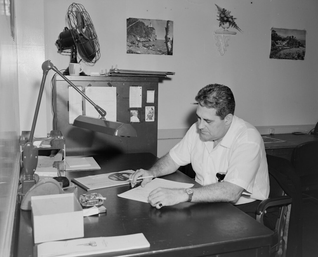 author writing mystery novel at desk